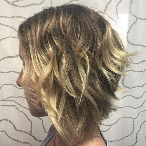 a line bob with beachy waves