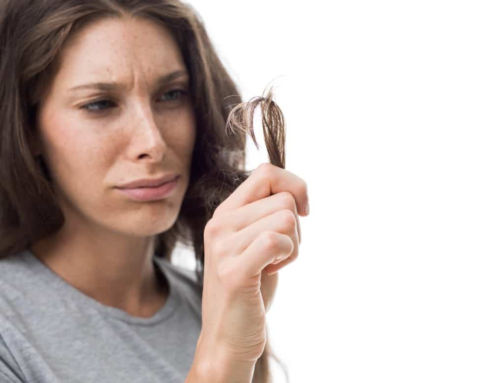 woman worried about split ends